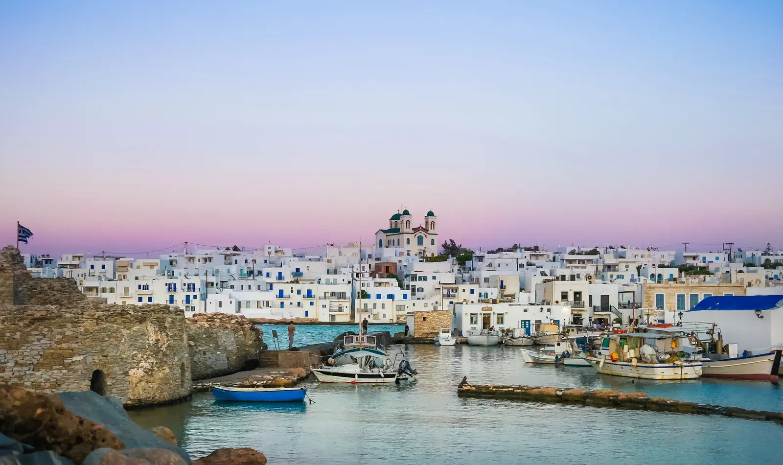 Old port in paros at sunset greece